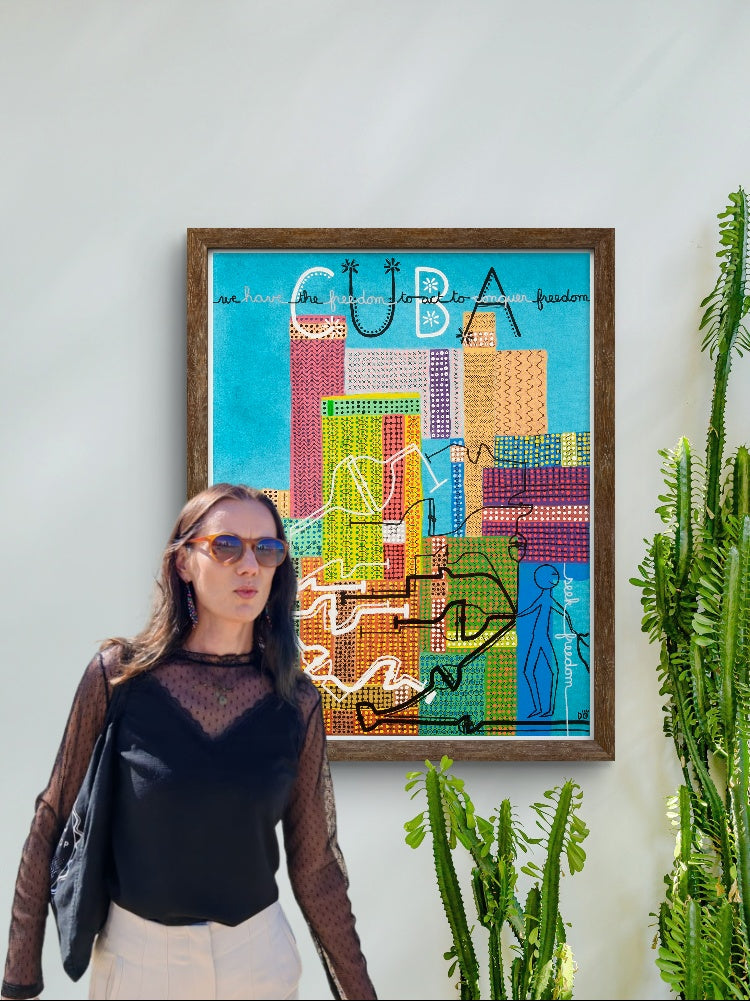 Dorothée Rodriguez-Velar standing beside her artwork “Cuba”, a vibrant abstract painting in bright blue, green and red tones, symbolizing culture and inner connection.