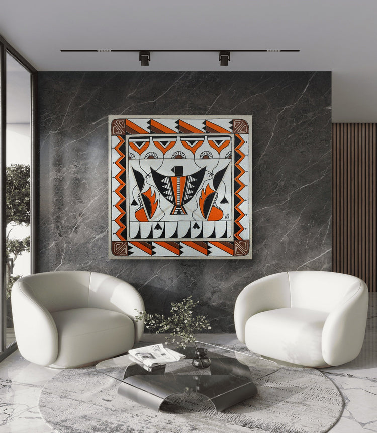 Contemporary painting with Maasai-inspired patterns in orange, black, and white, hanging on a modern gray wall, framed by two white designer armchairs – Art by Dorothée Rodriguez Velar.