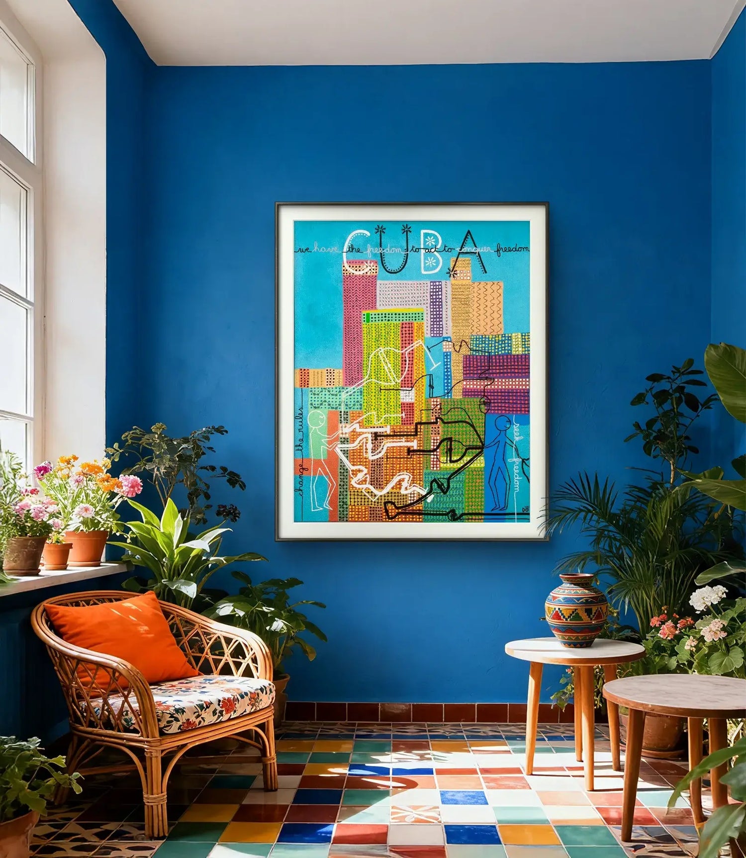 Colorful Cuba-inspired artwork hanging on a blue wall above a vibrant tropical chair and multicolored tiled floor.